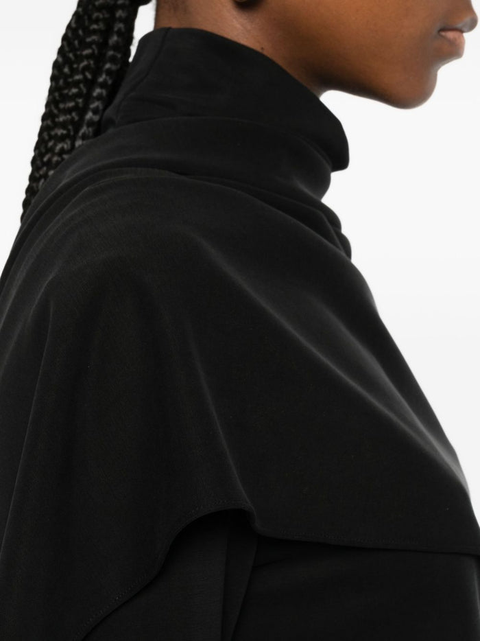 Auf dem schwarzen Damen-Trikot 4